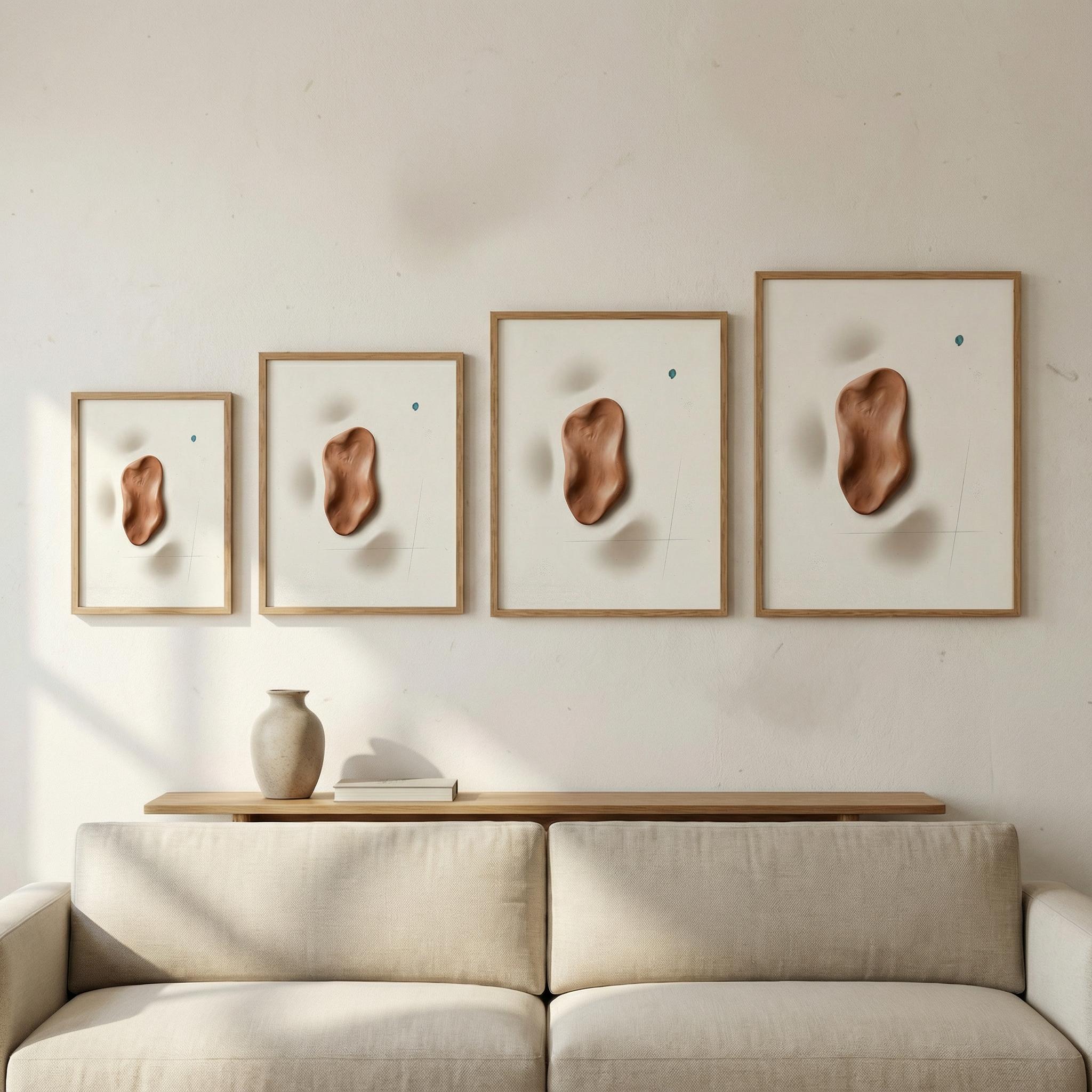 Size comparison mockup showing four framed sizes of “Terracotta Relief Drop” on one wall, smallest to largest, clean options proof in a minimalist interior.